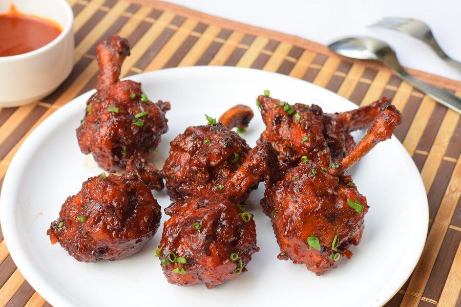 high-angle-shot-delicious-hot-spicy-dish-called-drums-heaven-table_181624-50861.jpg