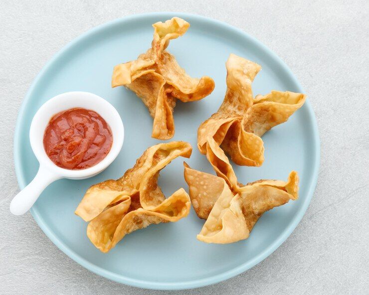 pangsit-goreng-delicious-pangsit-ayam-goreng-chicken-fried-dumpling-made-from-flour-chicken_583400-988.jpg
