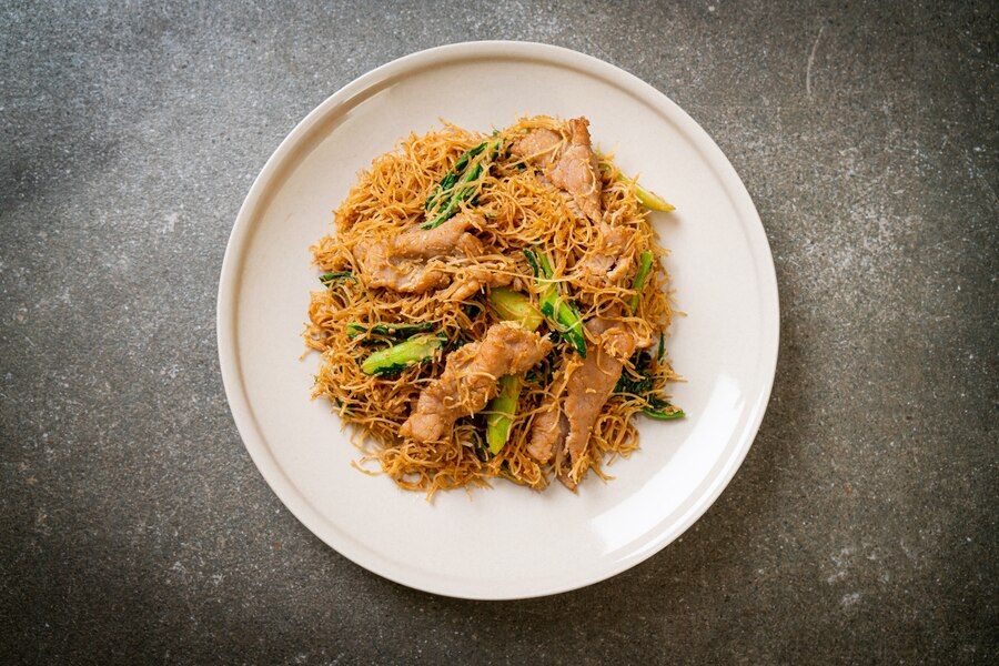 stir-fried-rice-vermicelli-noodle-with-black-soy-sauce-pork_1339-101274.jpg